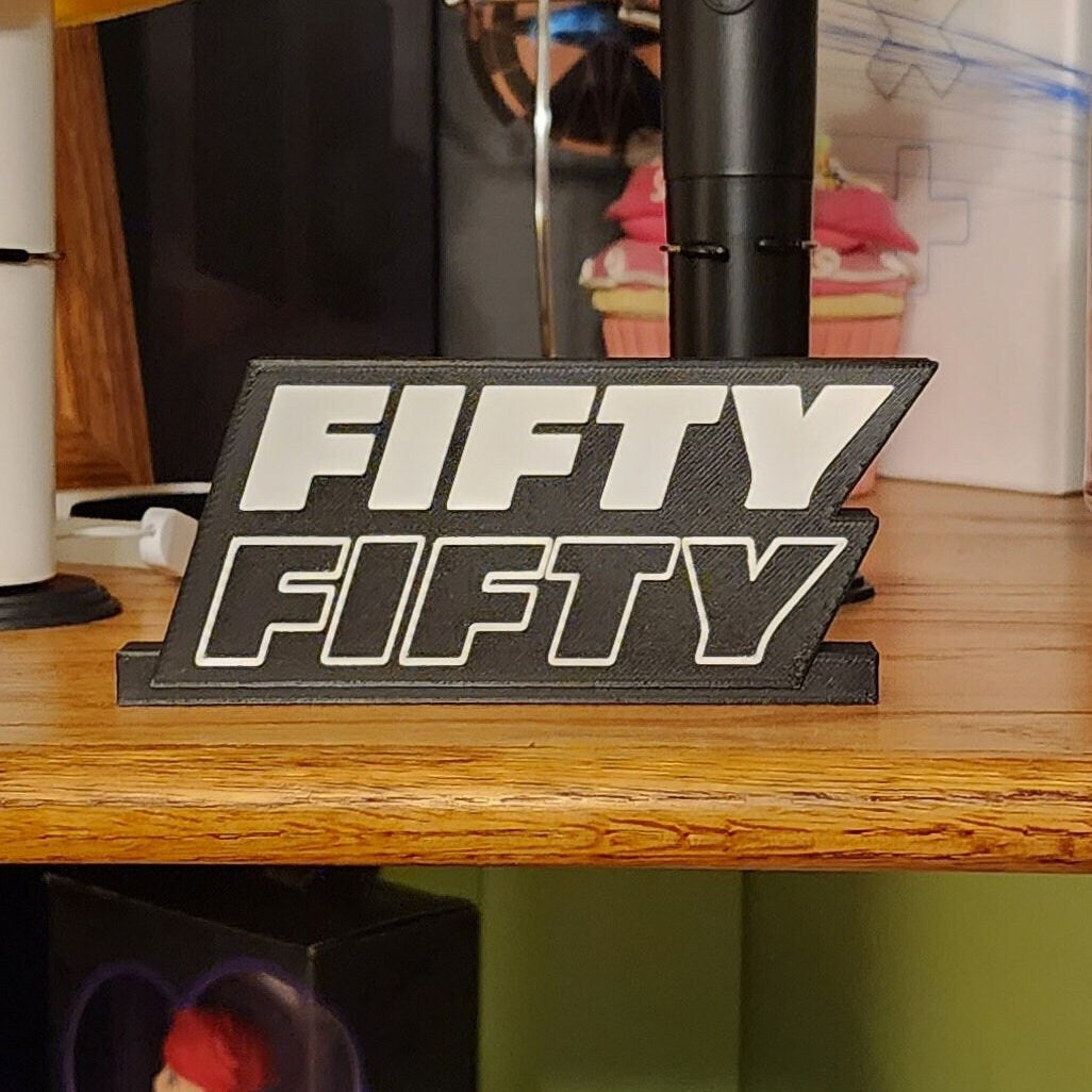 Fifty Fifty Standee